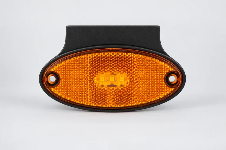 NOVA M3 oval amber marker-light presentation with two end fixing positions and flat upper mounting extension