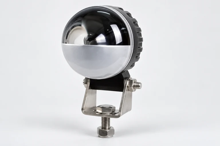 NW-U5 reference presentation showing a domed split-face lamp and lower metal bracket, without a projected beam